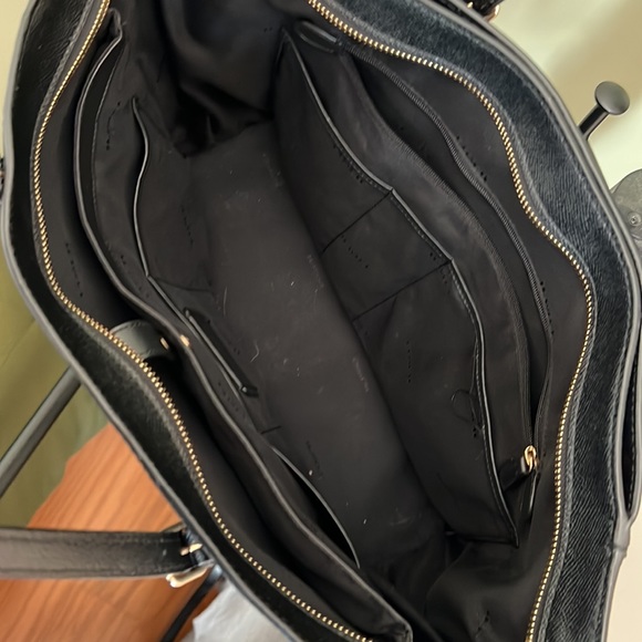 Coach tote with no wear and tear. Very spacious and comes with a dust bag!! - Picture 6 of 6